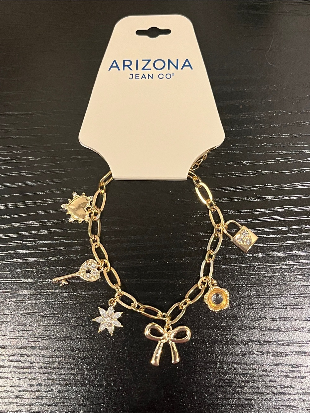 NWT Beautiful Gold Charm Bracelet- Bow, Lock, Key, Heart & Flower Crystal Charms